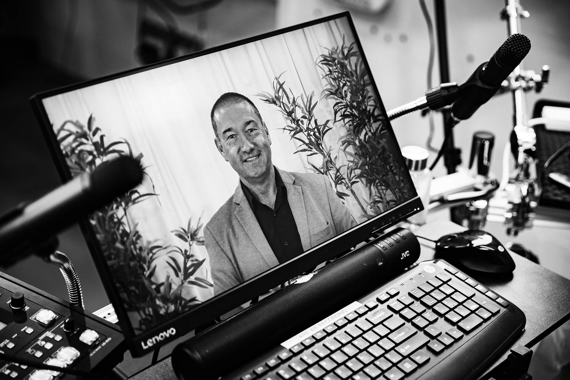 Lee Woodward on laptop screen